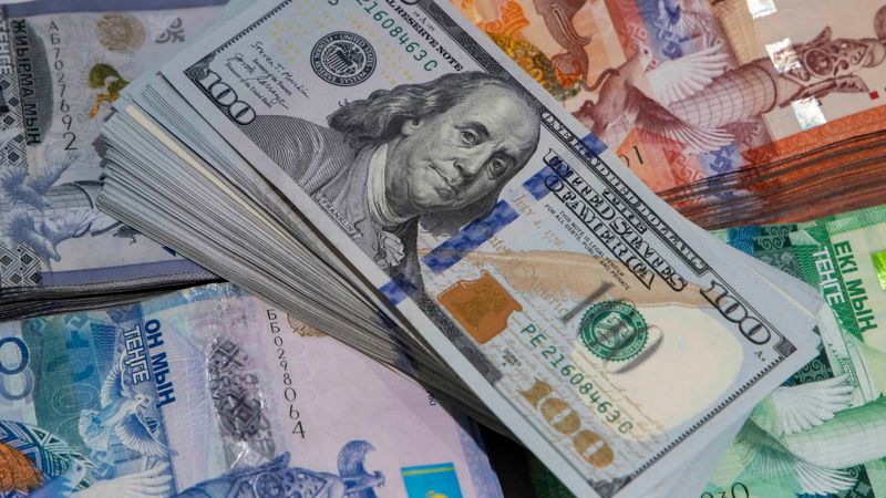 тенге, доллары Казахстан увеличит свою долю в уставном капитале ЕАБР