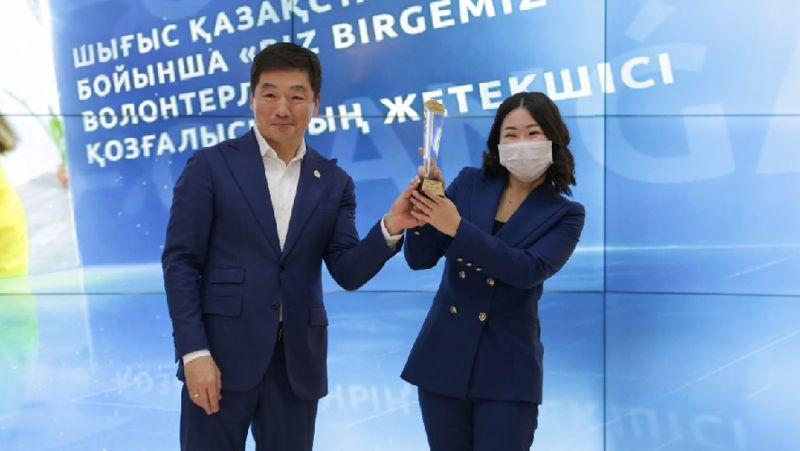 Бауыржан Байбек награждение партия, Nur Otan, волонтеры
