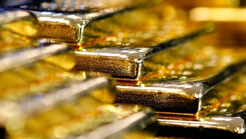 Золотые слитки Снижение золотовалютных резервов Нацбанка в июне 2022 года